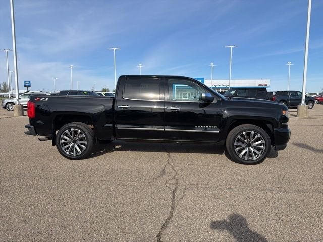 Used 2018 Chevrolet Silverado 1500 LTZ with VIN 3GCUKSEJ6JG103820 for sale in Albert Lea, Minnesota